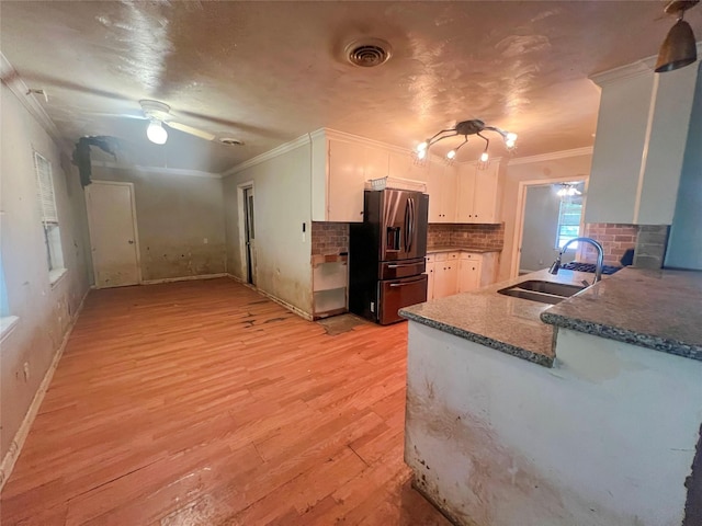 105 Longridge Dr, La Marque, TX 77568 - kitchen with crown molding, stainless steel fridge with ice dispenser, a sink, and light wood-type flooring