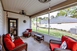 sunroom featuring ceiling fan and an outdoor hangout area