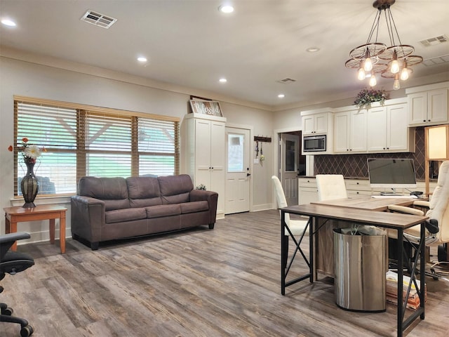 22624 County Road 1174, Bullard, TX 75757 - living room featuring visible vents, recessed lighting, a chandelier, and wood finished floors
