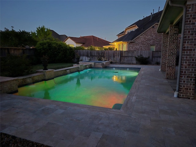 7106 Prairie Grass Ln, Katy, TX 77493 - view of swimming pool featuring a fenced backyard, a patio area, and a pool with connected hot tub