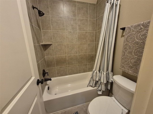 7106 Prairie Grass Ln, Katy, TX 77493 - bathroom with toilet, shower / bathtub combination with curtain, and tile patterned flooring
