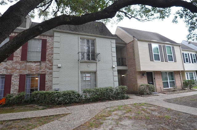 view of front of property with brick siding