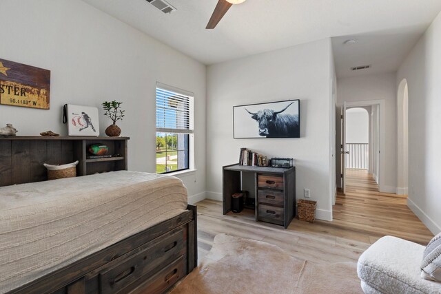 26719 Outback Dr, Katy, TX 77493 - bedroom featuring visible vents, light wood-style flooring, ceiling fan, and baseboards