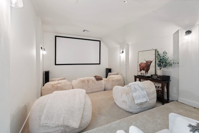 26719 Outback Dr, Katy, TX 77493 - cinema featuring carpet floors, visible vents, baseboards, and lofted ceiling