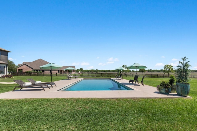 26719 Outback Dr, Katy, TX 77493 - view of swimming pool with a yard, fence, and a patio