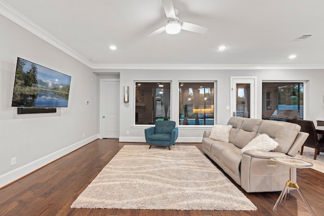 6931 Harvest Ln, Katy, TX 77493 - living room with crown molding, baseboards, dark wood-style floors, and visible vents
