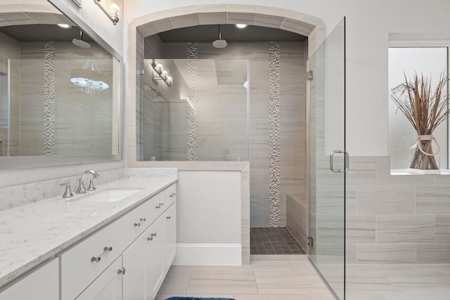 6931 Harvest Ln, Katy, TX 77493 - bathroom with a shower stall and vanity