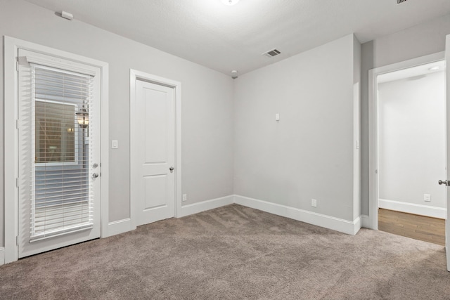 6931 Harvest Ln, Katy, TX 77493 - carpeted spare room featuring visible vents and baseboards