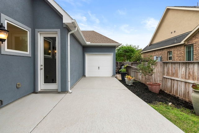 6931 Harvest Ln, Katy, TX 77493 - exterior space featuring concrete driveway, fence, and a garage