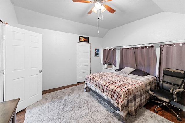 6503 Ave C, Houston, TX 77011 - bedroom with ceiling fan, baseboards, vaulted ceiling, and wood finished floors