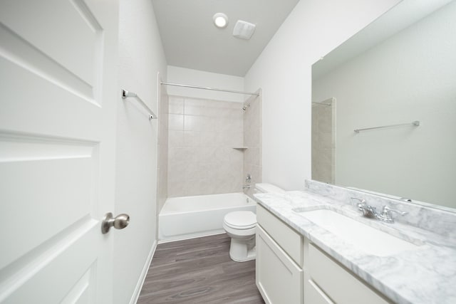 3001 Plains Cir, Brookshire, TX 77423 - full bathroom featuring toilet, wood finished floors, vanity, and bathtub / shower combination