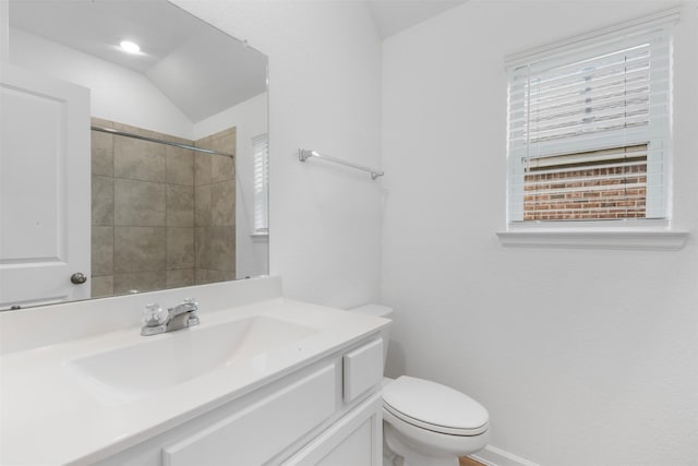 3319 Meadknoll Ln, Richmond, TX 77406 - bathroom with toilet, vanity, tiled shower, and vaulted ceiling