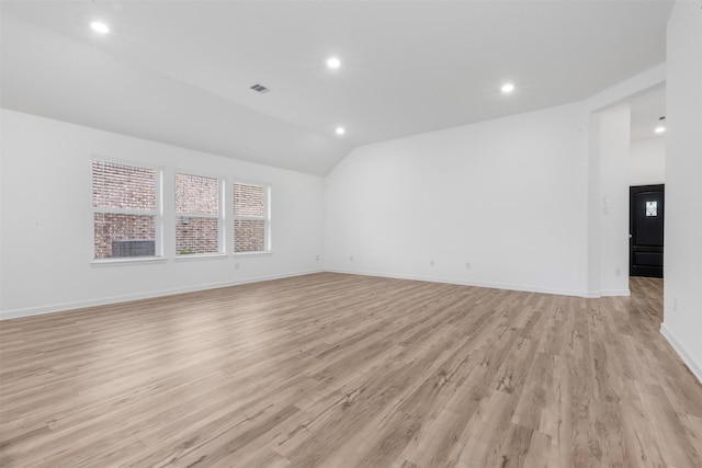 3319 Meadknoll Ln, Richmond, TX 77406 - empty room with recessed lighting, light wood-type flooring, vaulted ceiling, and baseboards
