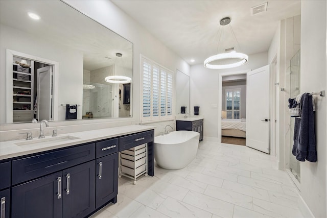 ensuite bathroom featuring a shower stall, ensuite bath, visible vents, and marble finish floor