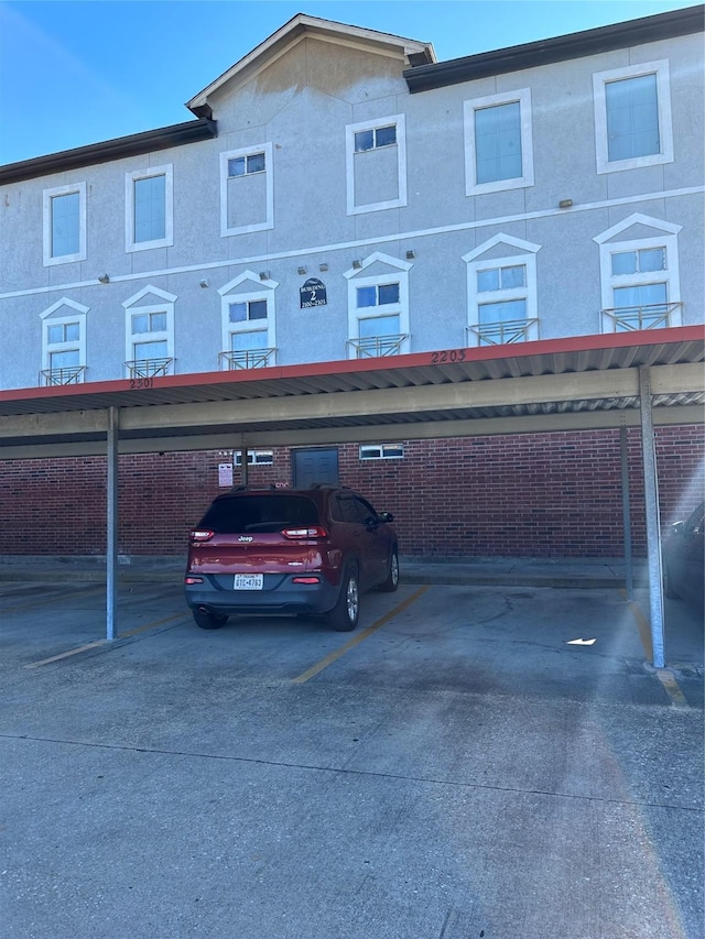 6289 Wilcrest Dr Unit 2203, Houston, TX 77072 - view of covered parking lot