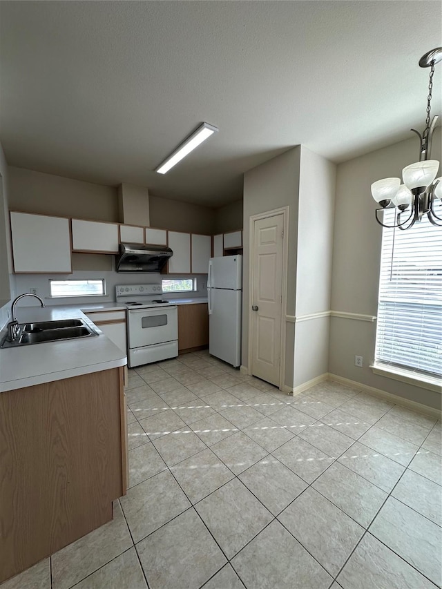 6289 Wilcrest Dr Unit 2203, Houston, TX 77072 - kitchen featuring an inviting chandelier, white appliances, under cabinet range hood, light countertops, and a sink