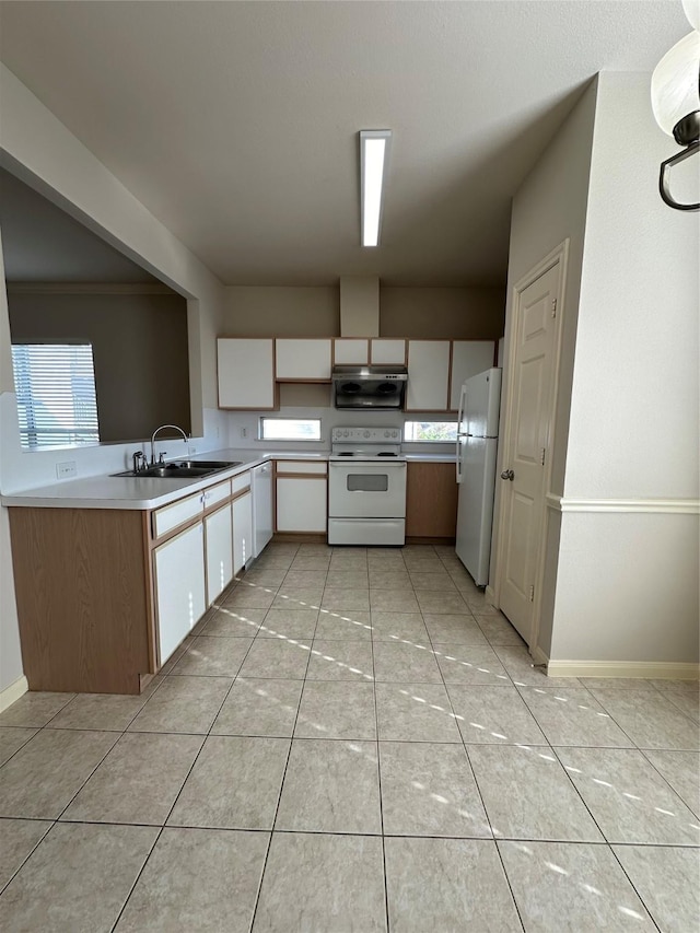 6289 Wilcrest Dr Unit 2203, Houston, TX 77072 - kitchen featuring white appliances, light countertops, white cabinetry, range hood, and a sink