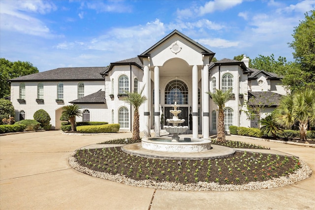 22009 Holly Creek Trl, Tomball, TX 77377 - view of property featuring curved driveway