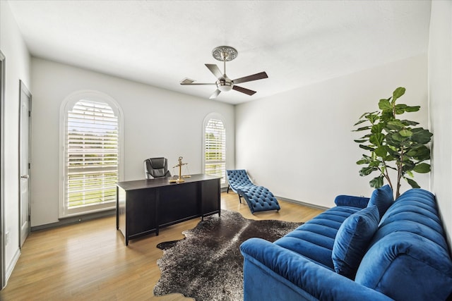 22009 Holly Creek Trl, Tomball, TX 77377 - office featuring light wood-type flooring and a ceiling fan