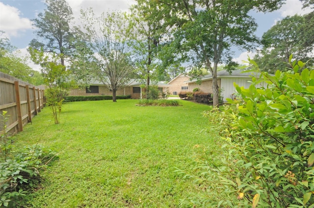 1110 Holly Dr, Conroe, TX 77301 - view of yard featuring fence