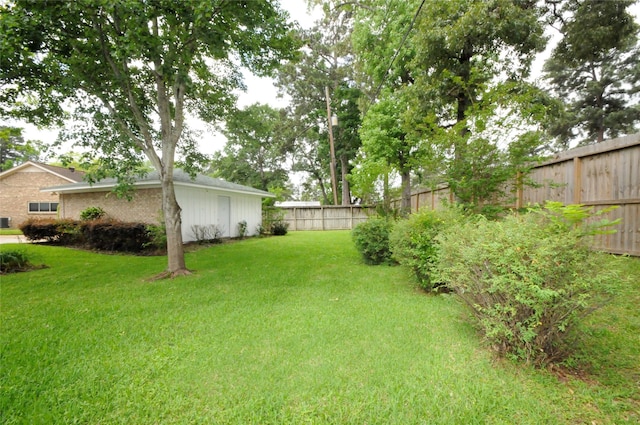 1110 Holly Dr, Conroe, TX 77301 - view of yard with a fenced backyard