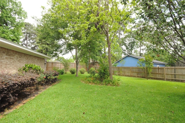 1110 Holly Dr, Conroe, TX 77301 - view of yard featuring a fenced backyard