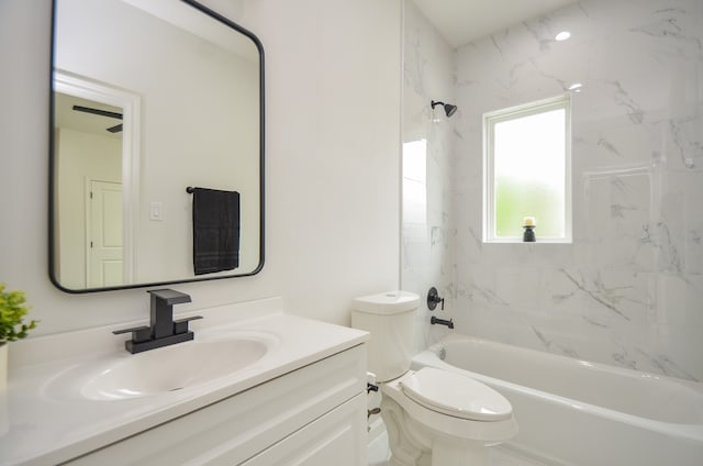 full bath with tub / shower combination, vanity, and toilet