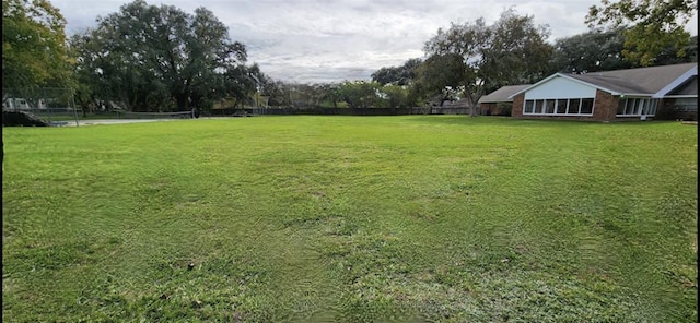 view of yard featuring fence