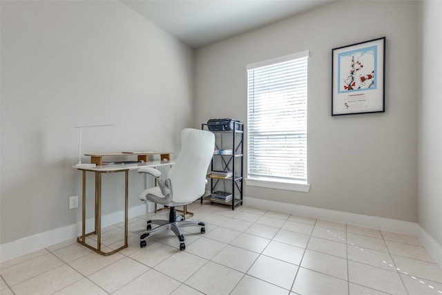 2411 Ocean Key Dr, La Marque, TX 77568 - office area featuring tile patterned flooring and baseboards