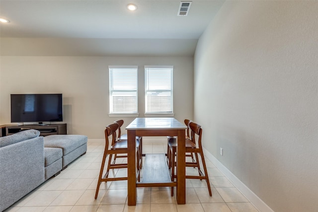 2411 Ocean Key Dr, La Marque, TX 77568 - dining room with recessed lighting, light tile patterned floors, visible vents, and baseboards