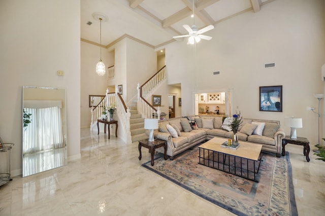 living room featuring stairway, marble finish floor, a towering ceiling, visible vents, and a ceiling fan