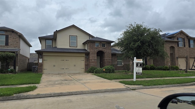 traditional home featuring a front lawn, brick siding, a garage, cooling unit, and concrete driveway