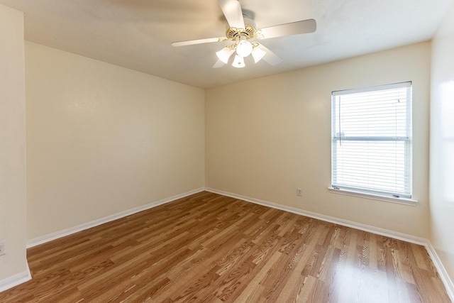 23222 Drywood Crossing Ct, Spring, TX 77373 - empty room with light wood finished floors, baseboards, and ceiling fan