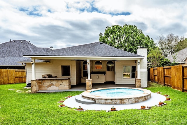 23222 Drywood Crossing Ct, Spring, TX 77373 - back of house featuring a shingled roof, area for grilling, a chimney, and exterior bar