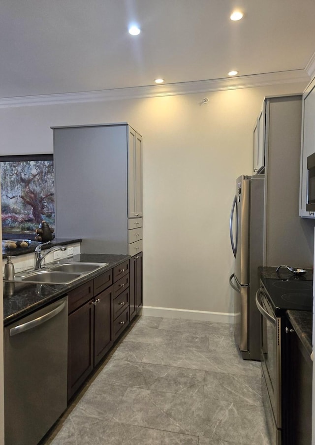 100 Willard St Unit 46, Houston, TX 77006 - kitchen with a sink, appliances with stainless steel finishes, dark countertops, and crown molding