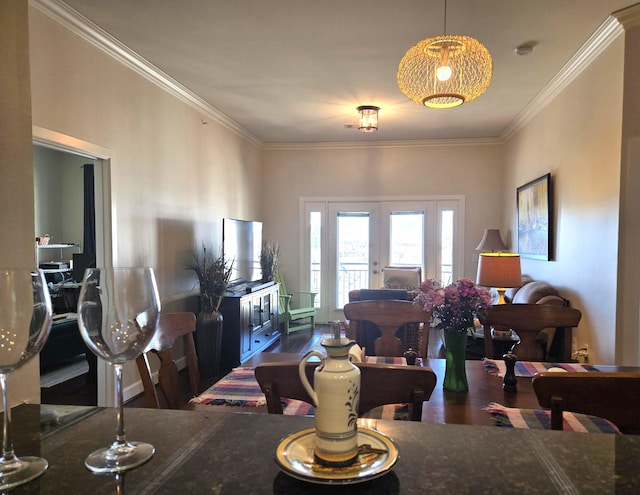 100 Willard St Unit 46, Houston, TX 77006 - living area featuring french doors, wood finished floors, and ornamental molding