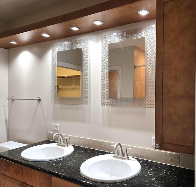 100 Willard St Unit 46, Houston, TX 77006 - bathroom featuring recessed lighting, double vanity, and a sink