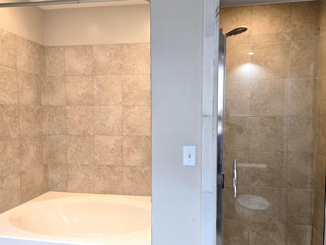 100 Willard St Unit 46, Houston, TX 77006 - bathroom with a shower stall and a tub to relax in