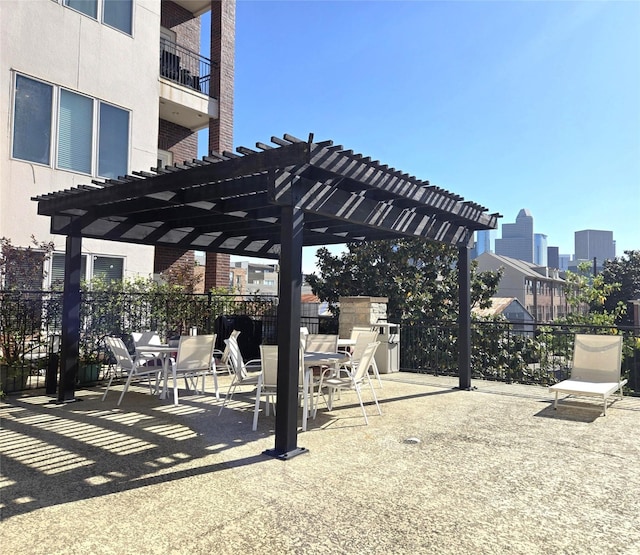 100 Willard St Unit 46, Houston, TX 77006 - view of patio / terrace featuring a pergola and fence