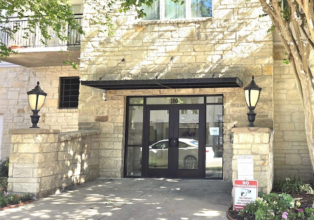 100 Willard St Unit 46, Houston, TX 77006 - entrance to property featuring french doors and stone siding