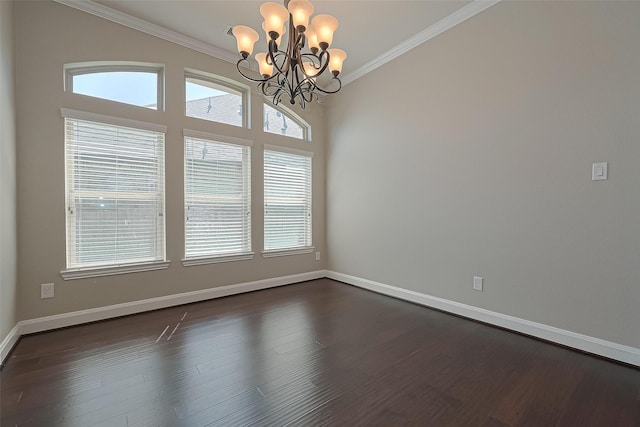 13207 Spurlin Meadow Dr, Tomball, TX 77377 - empty room featuring baseboards, ornamental molding, a chandelier, and a healthy amount of sunlight