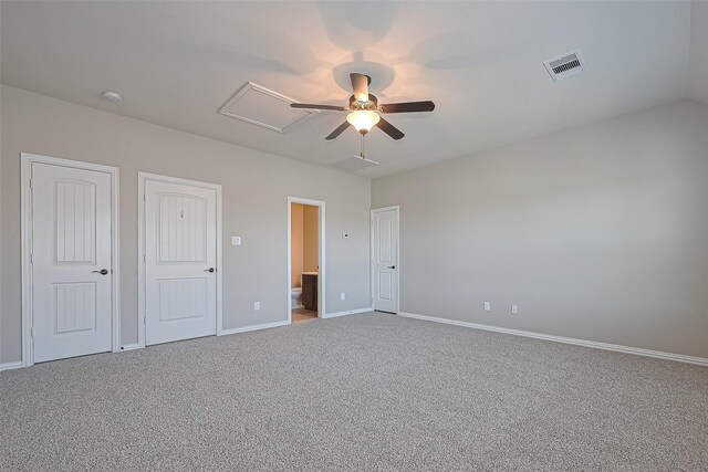 13207 Spurlin Meadow Dr, Tomball, TX 77377 - unfurnished bedroom with ceiling fan, visible vents, baseboards, ensuite bathroom, and carpet flooring