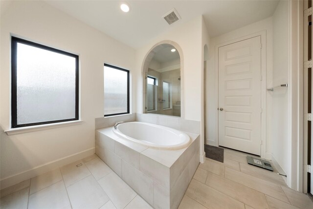bathroom featuring recessed lighting, tile patterned flooring, visible vents, a stall shower, and a garden tub