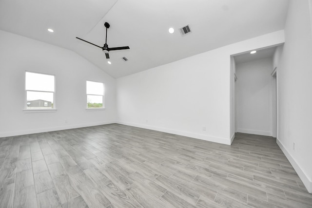 673 Rd 5822, Cleveland, TX 77327 - unfurnished room featuring a ceiling fan, recessed lighting, vaulted ceiling, light wood-style flooring, and baseboards