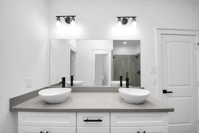 673 Rd 5822, Cleveland, TX 77327 - full bathroom with a shower stall and double vanity