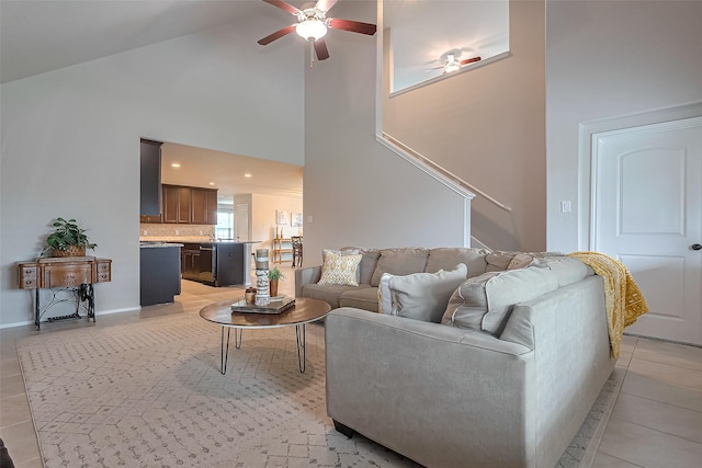 23806 Naples Shore Dr, Katy, TX 77493 - living room with recessed lighting, light tile patterned flooring, stairs, ceiling fan, and high vaulted ceiling