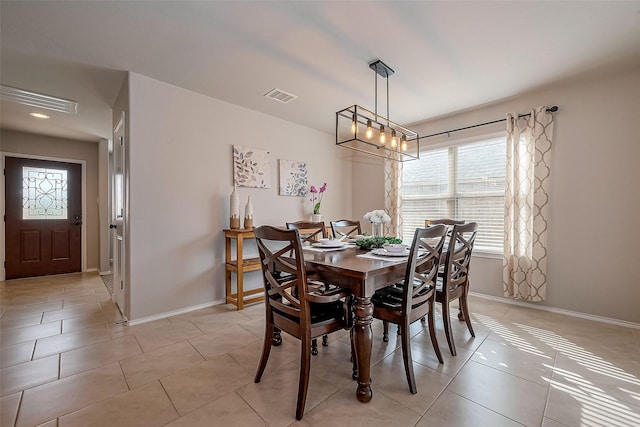 23806 Naples Shore Dr, Katy, TX 77493 - dining room with a chandelier, light tile patterned floors, baseboards, and visible vents