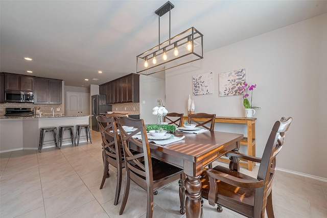 23806 Naples Shore Dr, Katy, TX 77493 - dining space featuring light tile patterned floors, baseboards, and recessed lighting