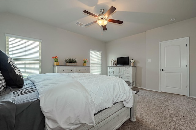 23806 Naples Shore Dr, Katy, TX 77493 - bedroom featuring visible vents, light colored carpet, baseboards, and a ceiling fan
