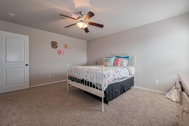 23806 Naples Shore Dr, Katy, TX 77493 - carpeted bedroom with baseboards and a ceiling fan